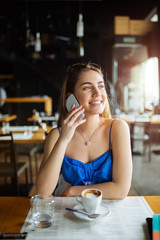 Beautiful woman talking on cell phone