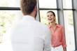 © NDABCREATIVITY - Happy business people shaking hands and being happy