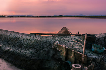 Wall Mural - Beautiful landscape at sunset salt Farm. Salt Farm is the place with so much sea-salt production in the country, Thailand.