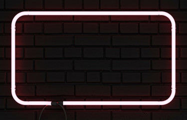 Wall Mural - Neon rectangle frame on black brick wall. 3D rendering