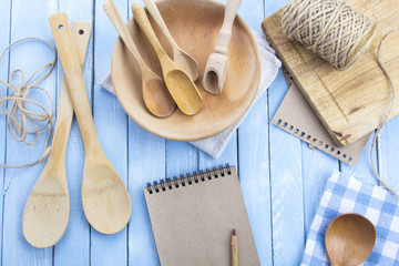 plate wooden spoons kitchen table rustic wooden background
