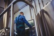 © WavebreakMediaMicro - Manufacturer using computer at brewery