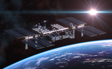 Wall Mural - international space station orbiting earth