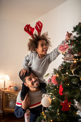 Wall Mural - Decorating Christmas tree