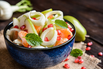 Wall Mural - Pear salad with fennel, mandarins and pomegranate