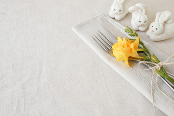 Wall Mural - yellow flowers and bunny rabbit, Easter table setting copy space