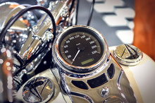 Expensive Motorcycle With Speedometer And Chrome Details.