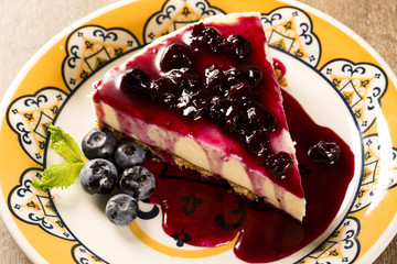 Wall Mural - Delicious cheesecake with berries