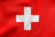 Flag of Switzerland waving, real fabric texture