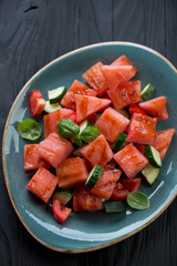 Poster - Grilled watermelon, tomato and cucumber salad, close-up