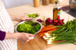 © lenetsnikolai - Young Woman Cooking in the kitchen. Healthy Food