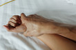 © somkanokwan - A hairy man's hand holding a woman hand for rape and sexual abus