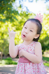 Wall Mural - Little asian girl thinking in park