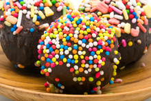 Selective Focus On Sweet Chocolate Cupcake Garnished With Colorf