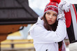 © ZoomTeam - winter, leisure, sport and people concept - happy young woman in