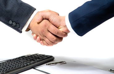 Two business men shaking hands
