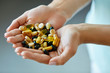 © puhhha - Vitamins And Supplements. Woman Hands Full Of Medication Pills