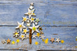 Merry Christmas: Christmas tree with stars on old blue wooden board :)