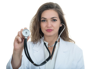 Wall Mural - Portrait of young friendly beautiful female doctor