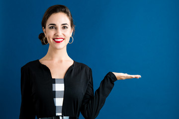 Young woman with a displaying hand gesture