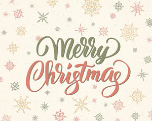 Wall Mural - Merry christmas brush lettering against background with snowflake