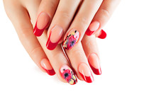 Female Hands With New Year Design On The Nails Holding Snowflake.Isolated.
