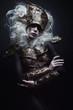 © EVGENY FREEONE - Woman with black make up and white wig