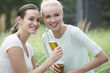© PhotoAlto - Women drinking beer together