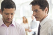 © PhotoAlto - Executive having difficult talk with employee