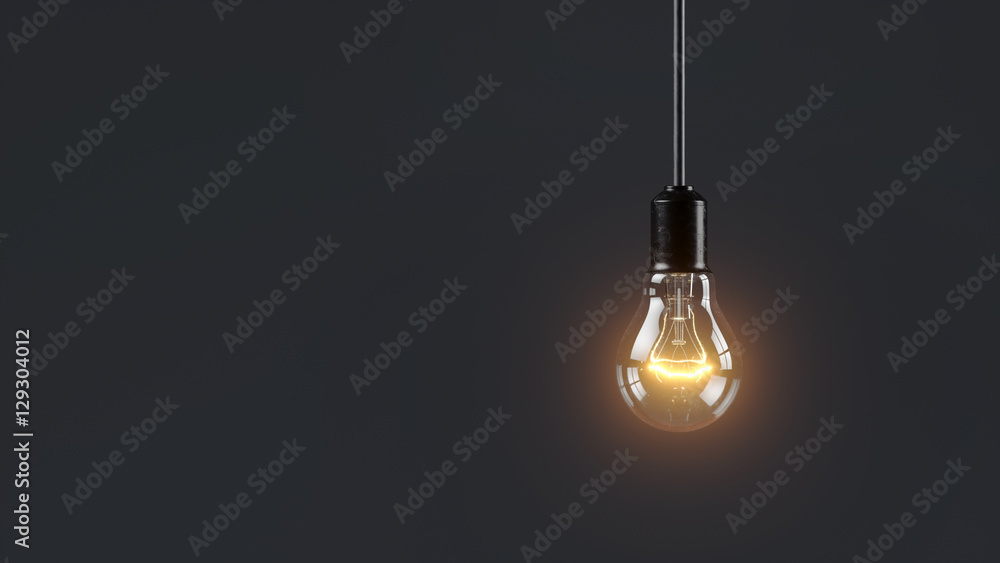 Electric lamp hanging on a wire in the room. Loneliness concept - obrazy, fototapety, plakaty 