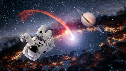 Wall Mural - astronaut planet saturn spaceman comet outer space suit galaxy universe. elements of this image furn