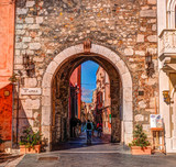 Fototapeta  - City gate in Taormina, Sicily, Italy, Europe