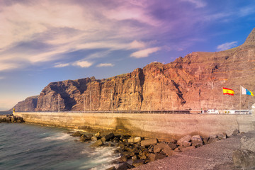 Wall Mural - Dramatic view of monumental Los Gigantes cliffs on shore of Tenerife, Canary Islands.