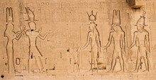 The South Wall Of The Temple Of Hathor At Dendera With Lion-headed Waterspouts. Cleopatra And Her Son Caesarian (on The Left Side)