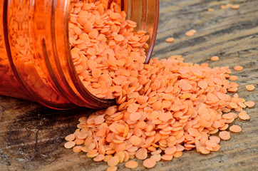 Canvas Print - lentil on table with jar