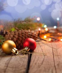 Christmas ornaments on a table in the snow with nice festive bac