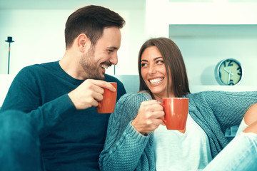 Cheerful couple in love in the morning