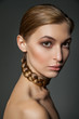 © julenochek - Woman with hair round necklace