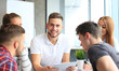 © ty - Group of young designers making sketches in office