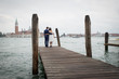 © icephotography - Loving married couple in Venice, Italy. hugging
