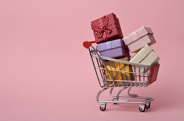 Wall Mural - shopping cart full of gifts