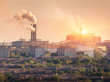 Metallurgy plant at sunset. Steel mill. Heavy industry factory. Steel factory with smog. Pipes with smoke. Metallurgical plant in city. steel, iron works. Ecology problems, atmospheric pollutants