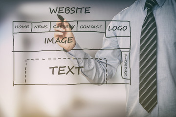 designer drawing website ux app development.