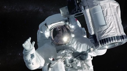 Wall Mural - astronaut in outer space over stars background.