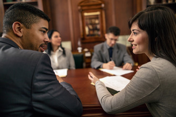 group of young business people or lawyers - meeting in an office