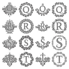Wall Mural - Vintage monograms set of letters Q, R, S, T. Heraldic coats of arms, symbols in floral round and square frames.
