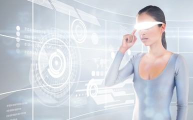 Poster - Composite image of young woman using virtual video glasses