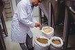 © WavebreakMediaMicro - Male manufacturer examining barley at brewery