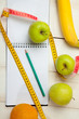 © denisk999 - Fruits and diet plan on a white wooden table