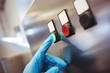 © WavebreakMediaMicro - Brewery manufacturer hand on start button at control panel